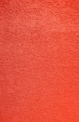 Plaster wall texture background. Rough stylish red plaster wall pattern.