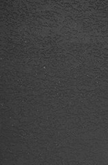 Plaster wall texture background. Rough old dark plaster wall pattern.