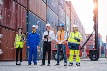Technicians or engineer with worker planning the transportation for import or export in the container yard warehouse,Container yard warehouse inspection.