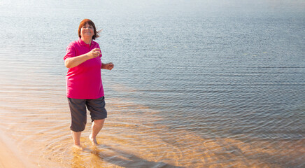 the pensioner regularly plays outdoor sports near the river and feels great in her seventy years,...
