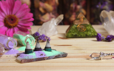 Incense Cones on Stone Slab With Crystals and Flowers