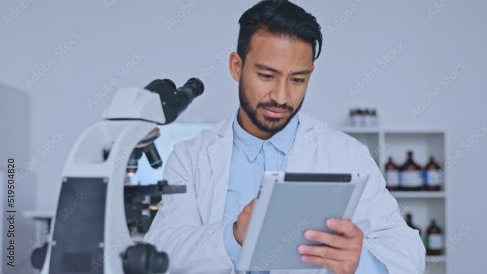 Poster young male professional scientist tests on microscope. happy, smiling man conducting medical researc