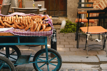 Turkish food cart with traditional bagels in the street of Istanbul