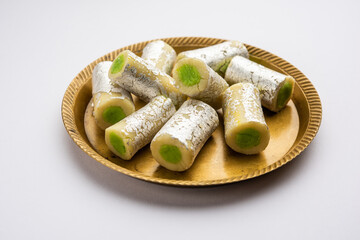 Kaju Pista Roll Or Cashew Pistachio Rolls Mithai or sigar, Indian sweet or dessert for festivals