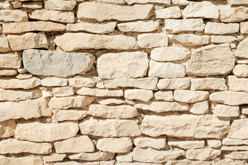 Ancient brick wall with interesting structure and texture in Provence, France