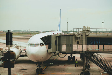 The plane is waiting for the passengers to fly from Terminal 3 of Soekarno Hatta International Airport, Indonesia.