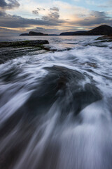 Fototapeta premium water rushing over rocks at umina point on NSW central coast