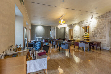 Interior of a hotel restaurant with marble floor