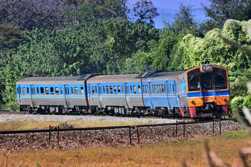 Obraz premium Diesel railcar on the railway in Thailand