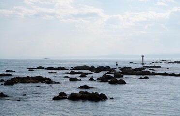 the Torii on the ocean.
the shrine beside beach.