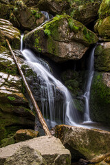Fototapeta na wymiar waterfall on the black stream in Hejnice