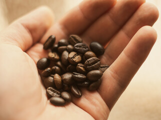 coffee beans in hands