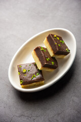 Choco Vanilla Pateesa or chocolate mawa barfi or or two layered burfi, Indian sweet or dessert