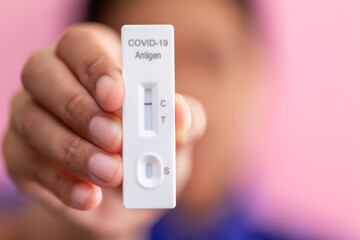 Rapid Covid-19 coronavirus strip test cassette for antibody or sars-cov-2 virus disease in hands...