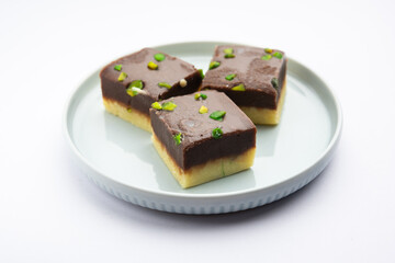 Choco Vanilla Pateesa or chocolate mawa barfi or or two layered burfi, Indian sweet or dessert