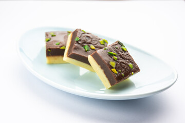 Choco Vanilla Pateesa or chocolate mawa barfi or or two layered burfi, Indian sweet or dessert