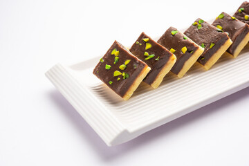 Choco Vanilla Pateesa or chocolate mawa barfi or or two layered burfi, Indian sweet or dessert