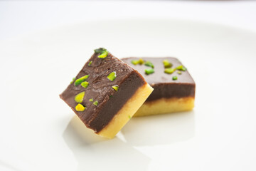 Choco Vanilla Pateesa or chocolate mawa barfi or or two layered burfi, Indian sweet or dessert