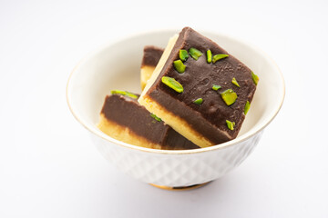Choco Vanilla Pateesa or chocolate mawa barfi or or two layered burfi, Indian sweet or dessert