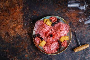 Smoked meat products in a plate.