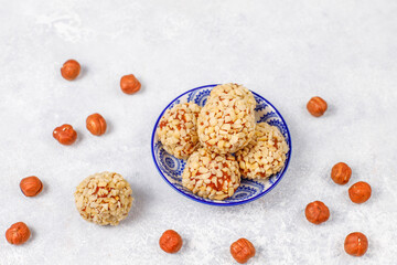 Fototapeta na wymiar Healthy Organic Energy balls with nuts and dried fruits. Traditional Turkish dessert.