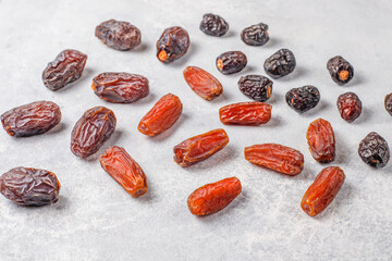 Fresh organic and various sweet dried date fruits.