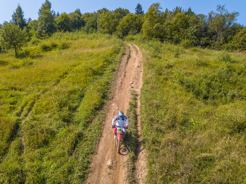 Motocrossman On A Dirt Path. Aerial View