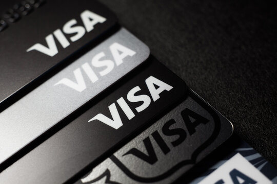 Close-up of Visa credit cards placed on a dark background. Macro photo. Moscow, Russia - March 14, 2022.