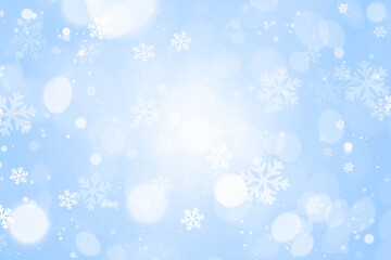 Snowflakes with bokeh on pastel blue background. Christmas concept