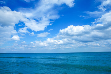 Fototapeta na wymiar Blue sea water surface on sky