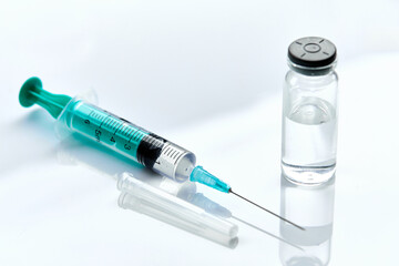  Vaccine in vial with syringe