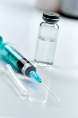  Vaccine in vial with syringe