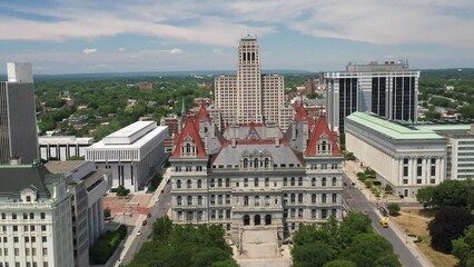 New York State capitol building in Albany, New York with drone video wide shot moving down.