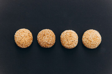 oatmeal cookies on a black background