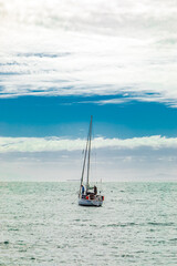 Fototapeta premium Cape Town, South Africa - May 12, 2022: Leisure boat on the water in Table Bay