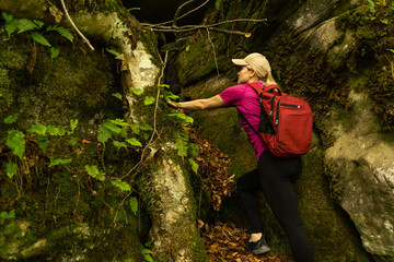 Naklejka na ściany i meble young woman hiking in Carpathian Mountains