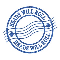 HEADS WILL ROLL, text written on blue postal stamp.