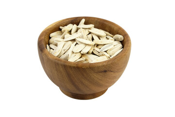 Sunflower seeds in wooden bowl isolated on white
