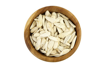 Sunflower seeds in wooden bowl isolated on white