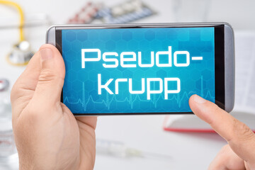 Smartphone mit dem Text Pseudokrupp auf dem Display