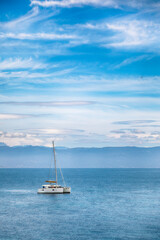 Fototapeta premium Private yacht under way out at sea.