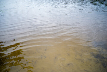 Water surface with brightness in the distance