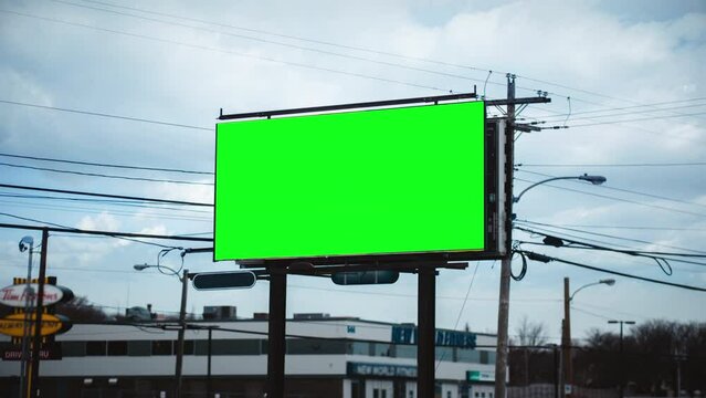Outdoor Billboard Green Screen Street Zoom In. Zoom in a green screen outdoor billboard standing in the street
