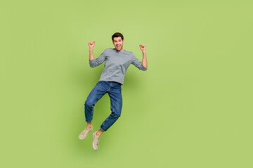 Full body photo of attractive student age man jumping up support his favorite football team...