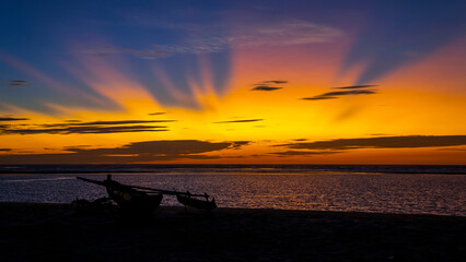 Sunset and sunrays with dramatic sky over Ocean , Madagascar