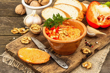 Traditional Middle Eastern dip Muhammara. Roasted red bell pepper with walnuts and spices