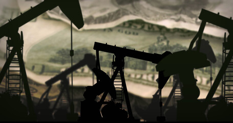 Image of working pumpjacks over banknotes