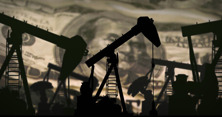 Image of working pumpjacks over banknotes