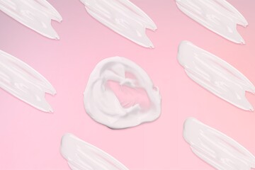 pattern of smears of white cream on a light background