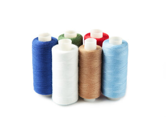 Color sewing threads isolated on white background
